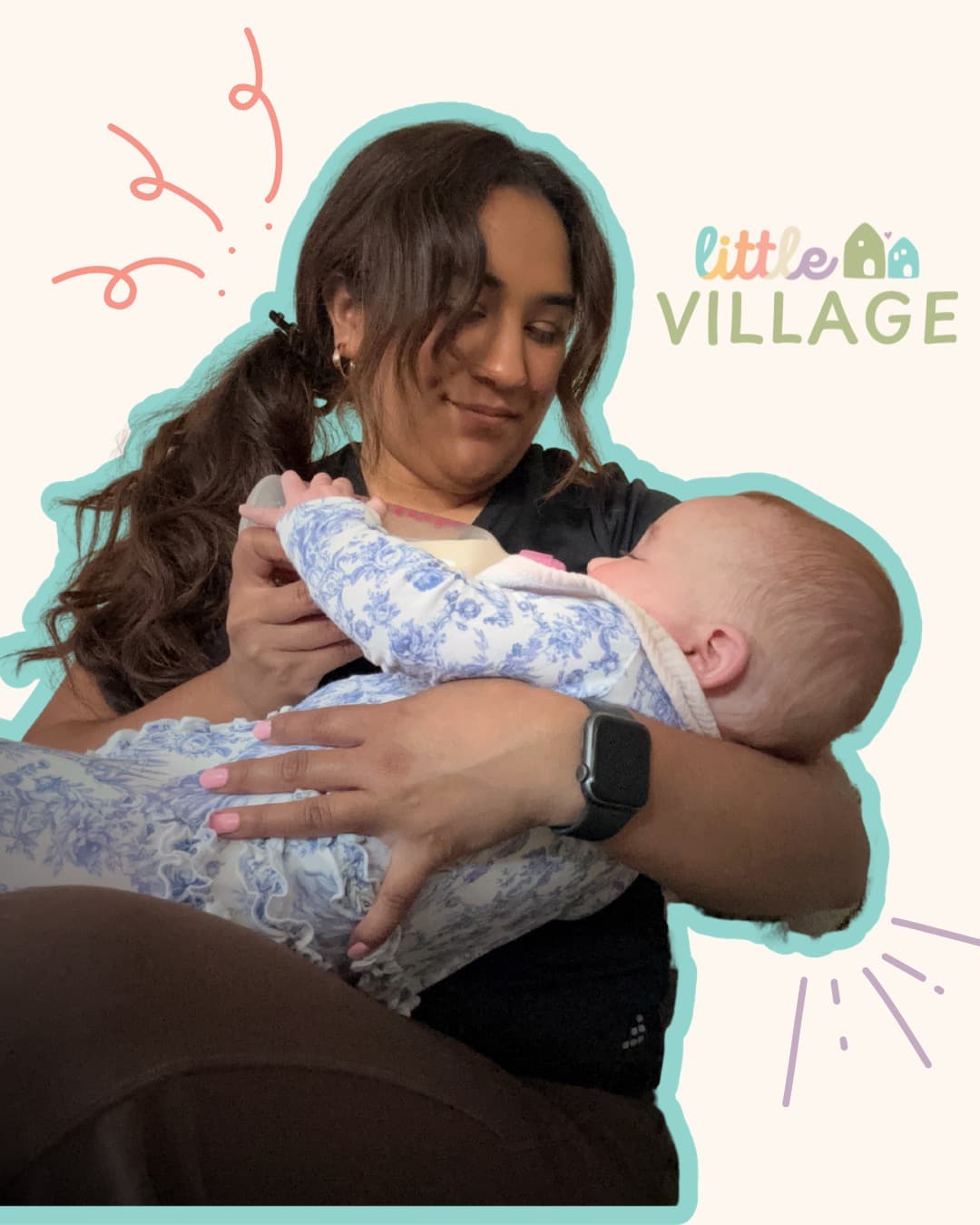 A woman holding a baby in her arms.